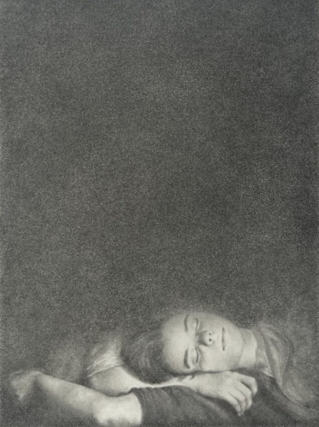 Woman sleeping on another's arm